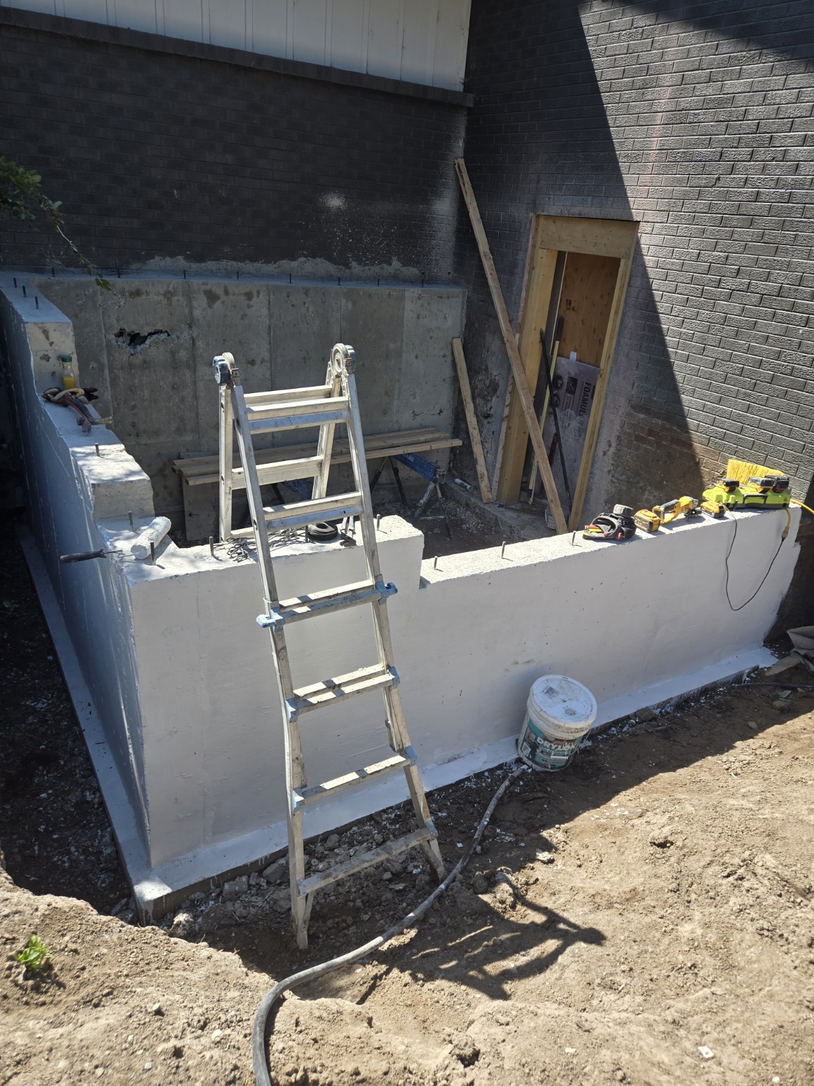 Completed reinforced concrete foundation walls