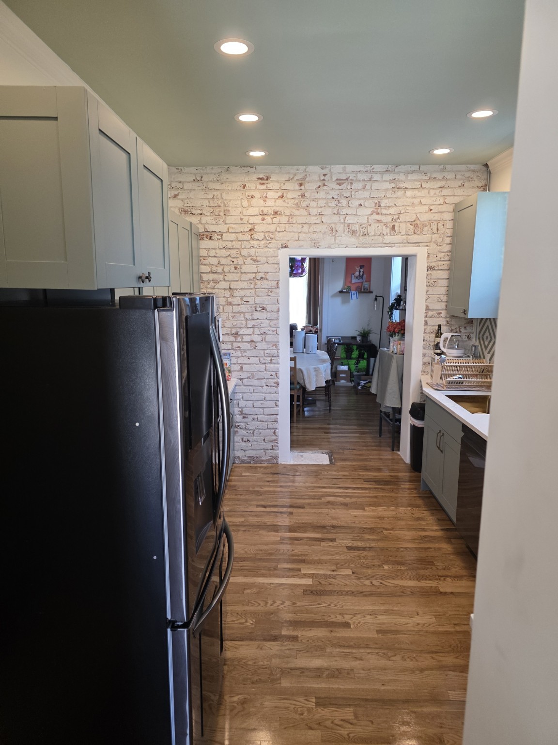 Completed widened opening in a load-bearing brick wall